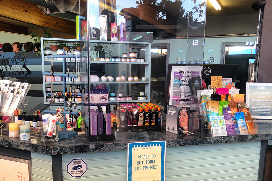 A display of hair and beauty products in a hair salon. 