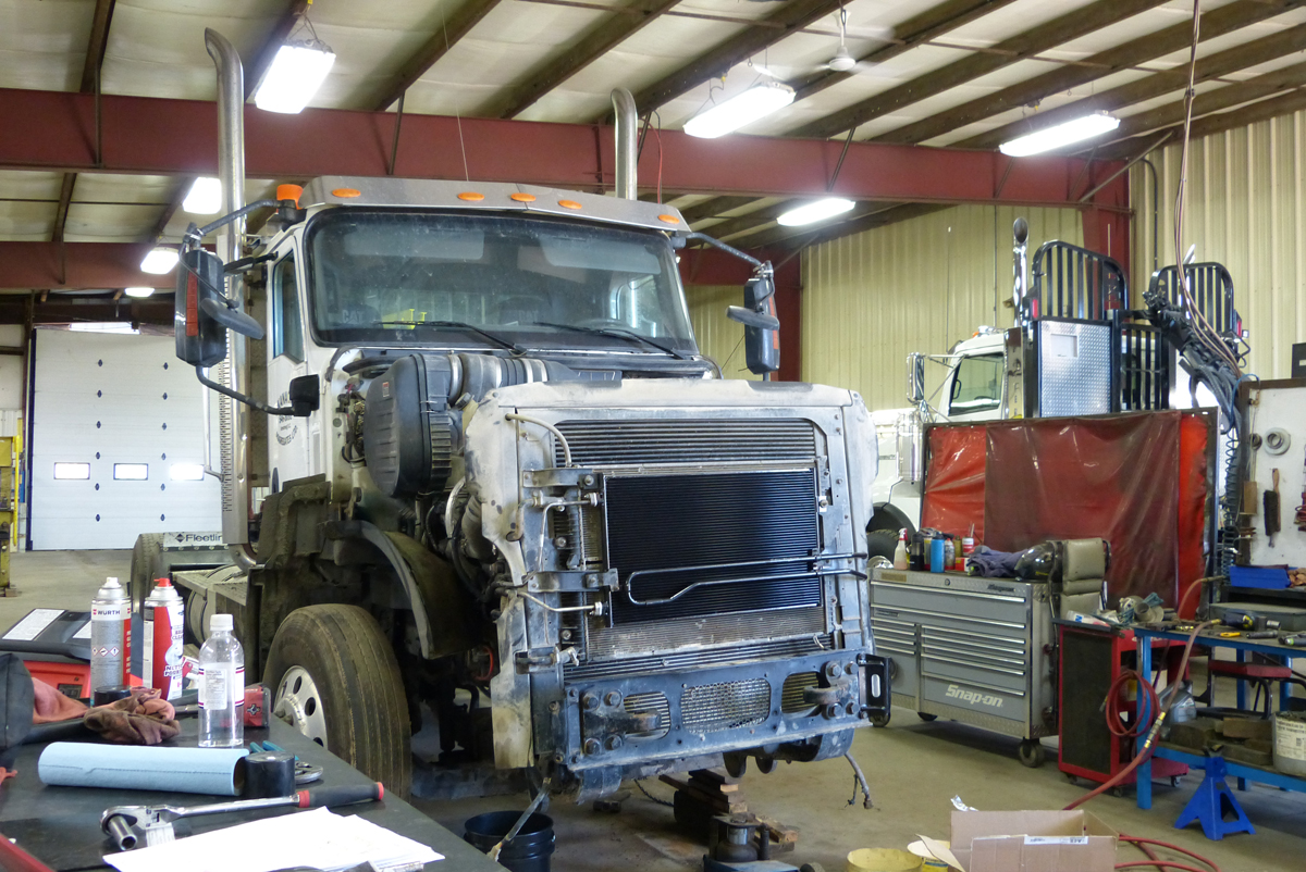 Semi truck getting repaired.