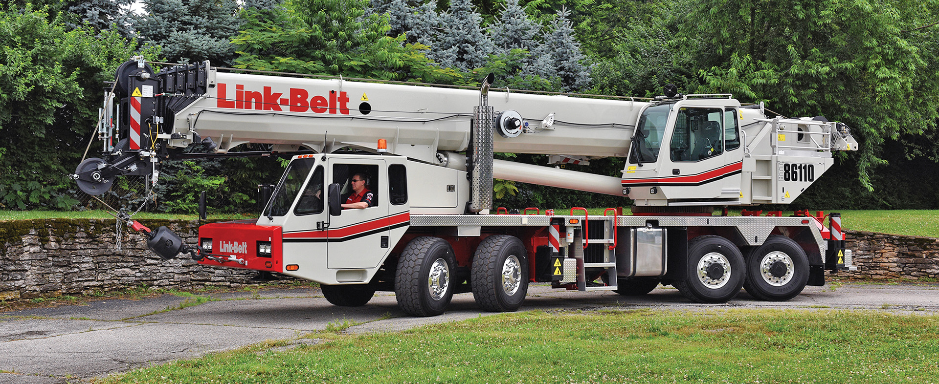 Link-Belt crane being driven by a staff member of PJB Crane Services in Sparwood 