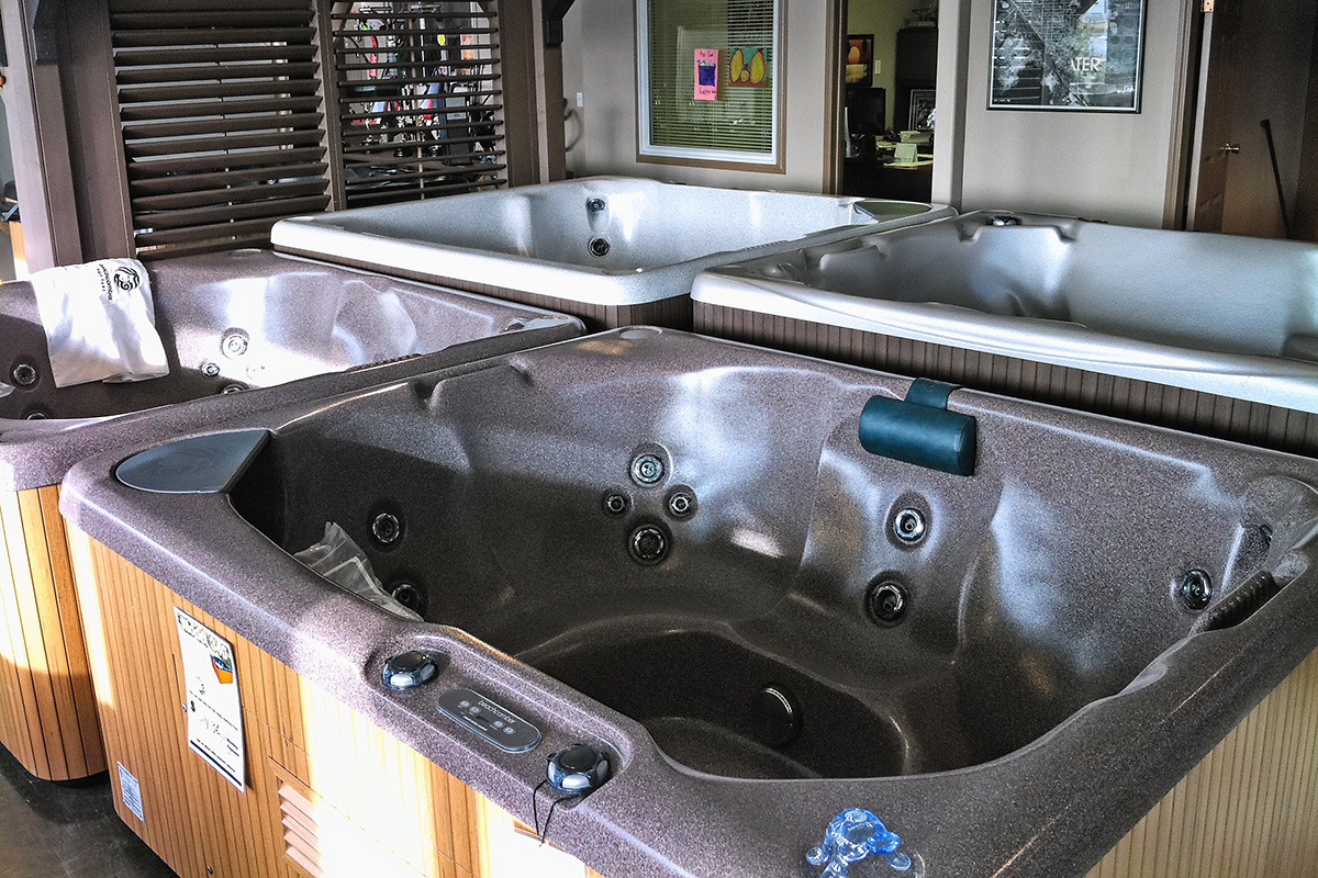 Hot Tubs on display for sale inside store 