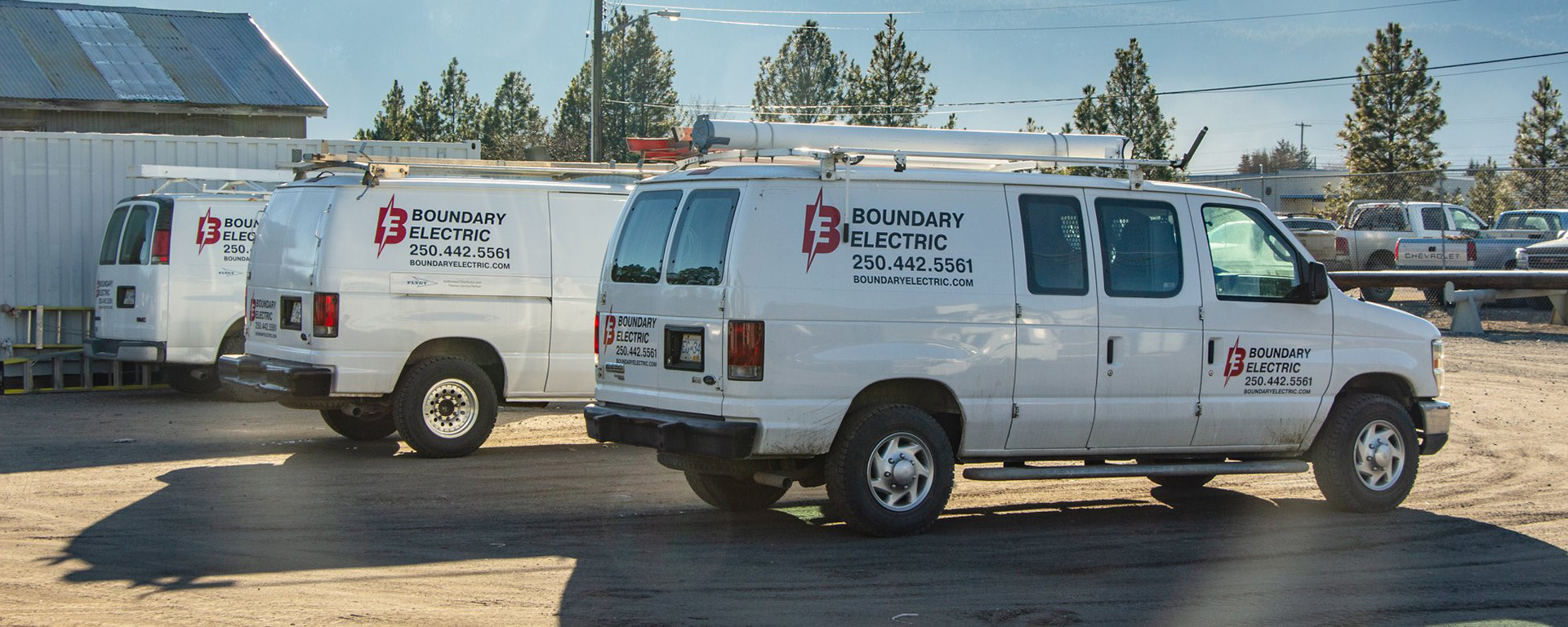 Boundary Electric service vans parked 