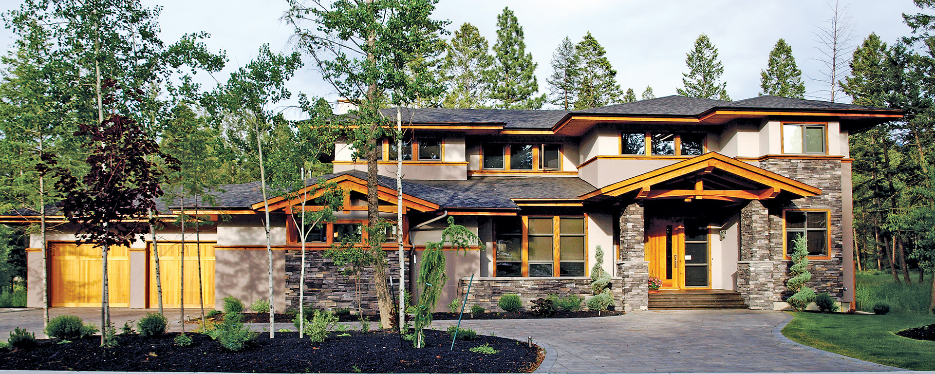 Large home with rock work on the exterior, built by New Dawn Developments in Cranbrook 