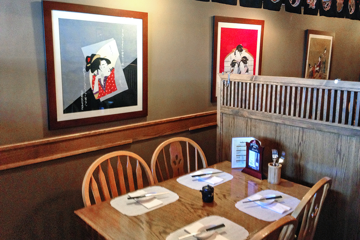 inside restaurant for Sakura Sushi and Grill with tables and chairs 