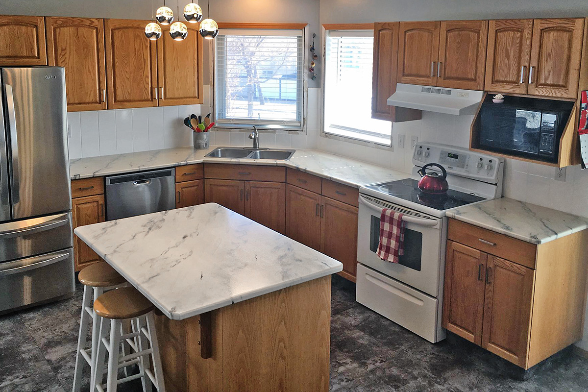 kitchen countertops redone by Re-Coat Renovations 