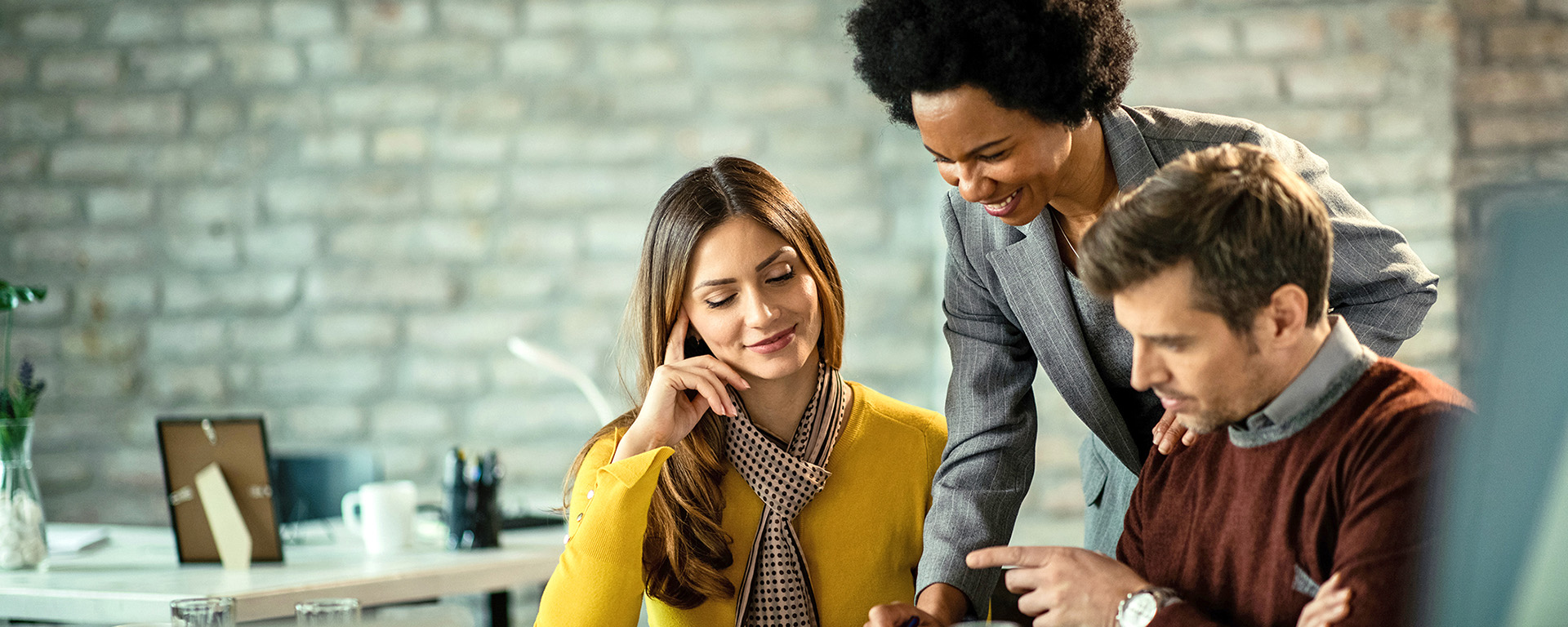 Financial advisor meeting with a young couple 