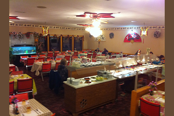Inside restaurant with several tables and chairs