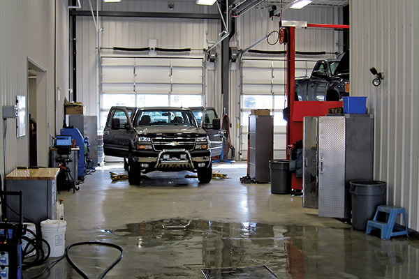 One truck parked in a service bay
