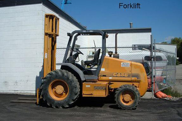 Forklift parked outside of building