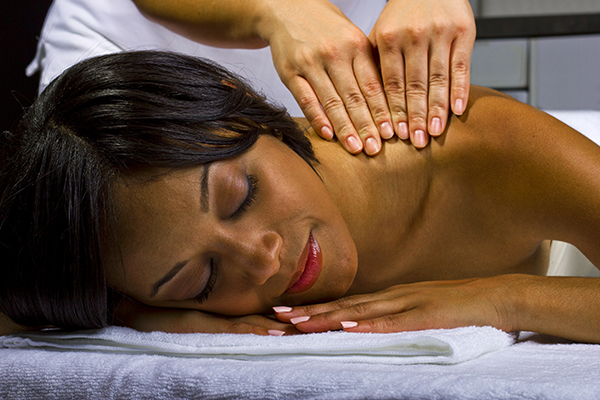 A woman getting a back massage