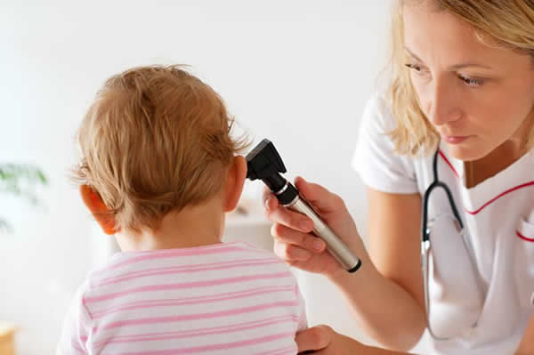 Toddler getting her hearing checked 