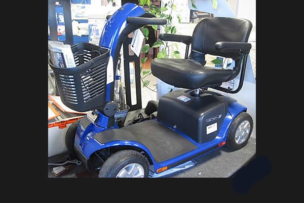black, gray, and blue motorized scooter