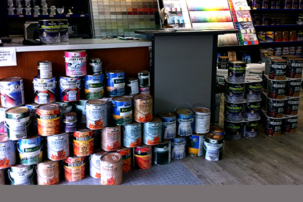 Cloverdale paint and cans of stains and primers
