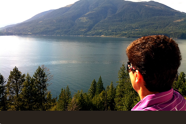 Head shot of a lady overlooking Kootenay Lake