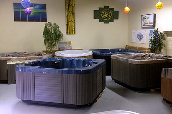 two hot tubs on display within store