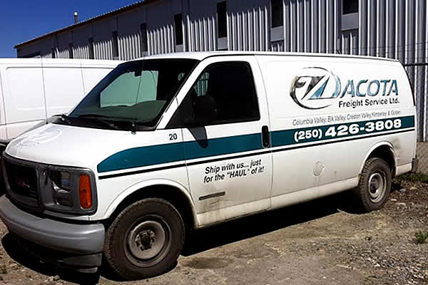 white company van advertising Dacota Freight Services