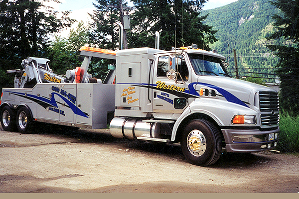 Semi tow truck advertising Western Auto Wreckers 