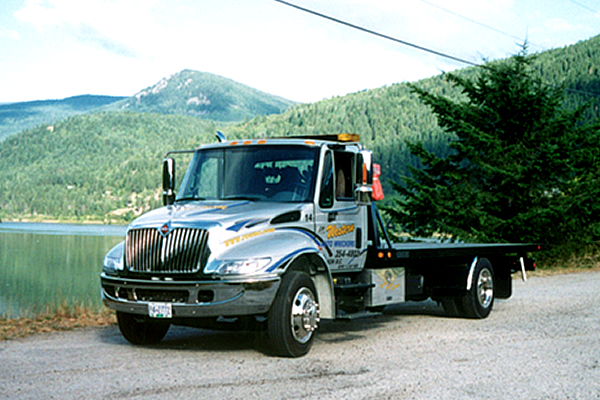 Semi tow truck advertising Western Auto Wreckers 