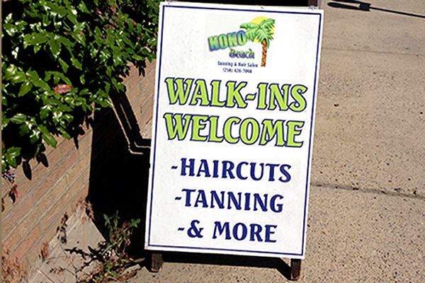 Sandwich board sign listing services offered