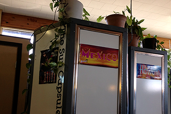Stand up tanning booths