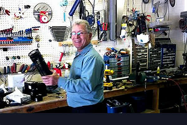 elderly man working in a shop
