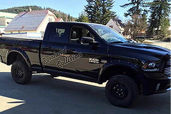 black truck advertising Rossland Collision