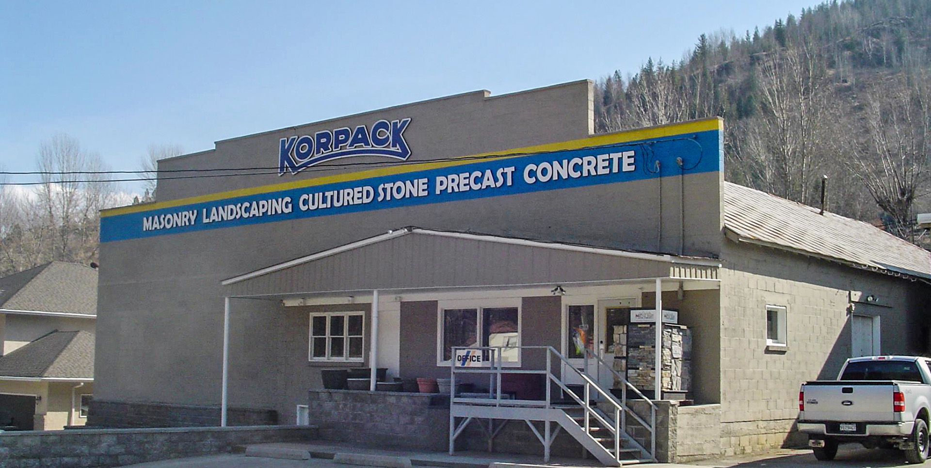 Outside of Korpack Cement Products building 