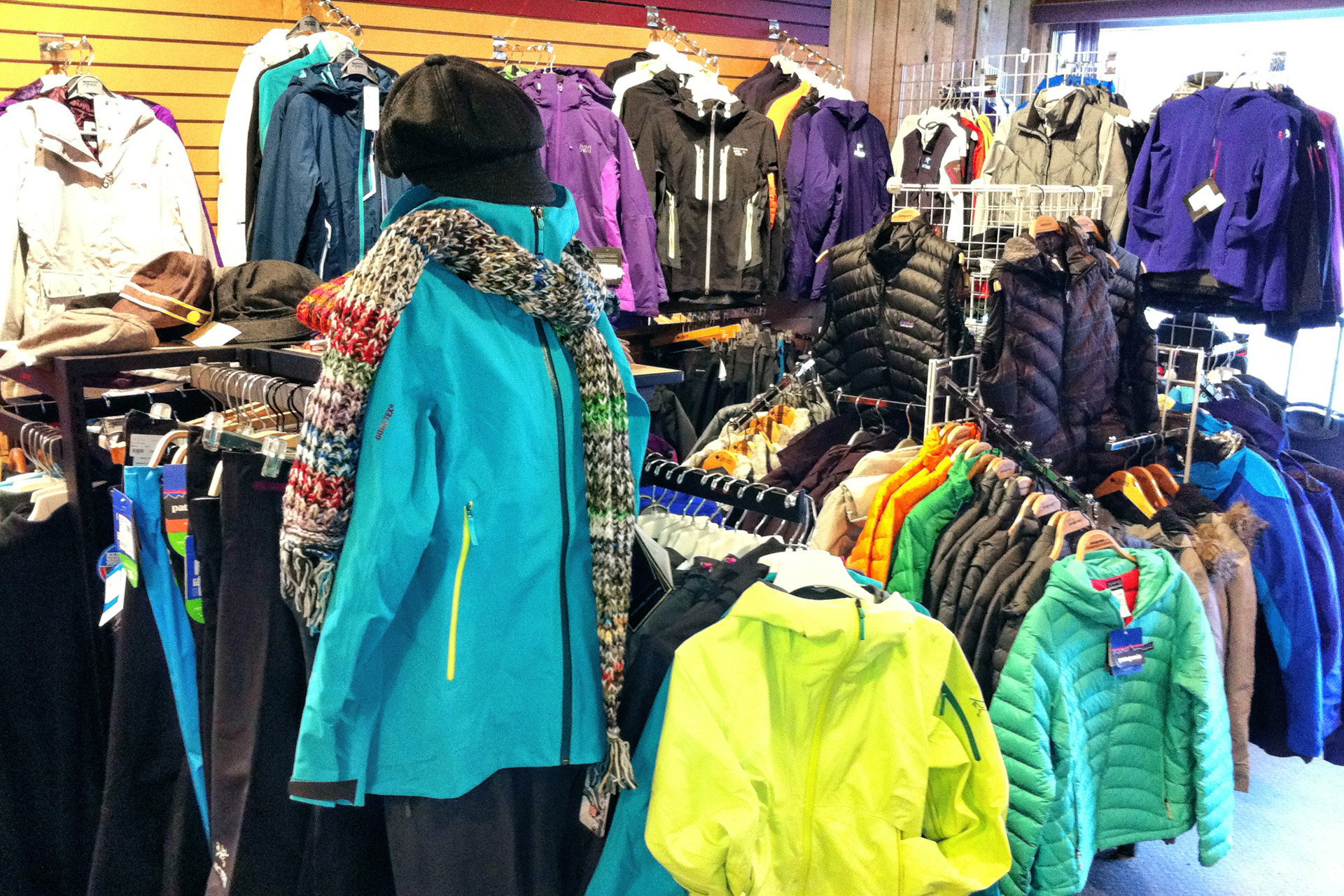 Interior of High Country Sports showing jackets and outdoor clothing. 