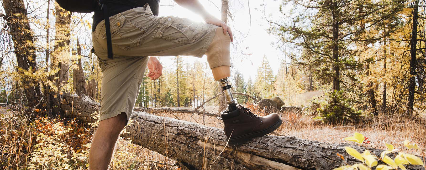 Man hiking with a prosthetic leg. 