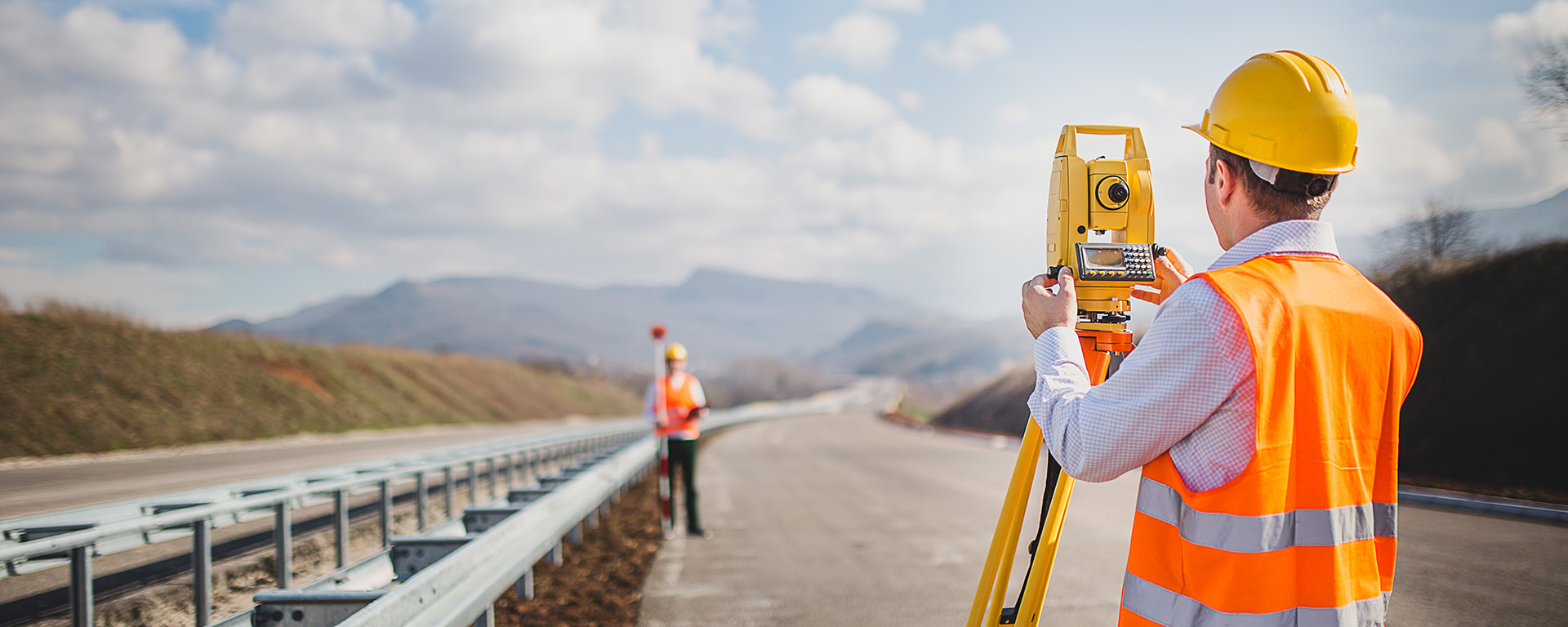 two surveyor on road 