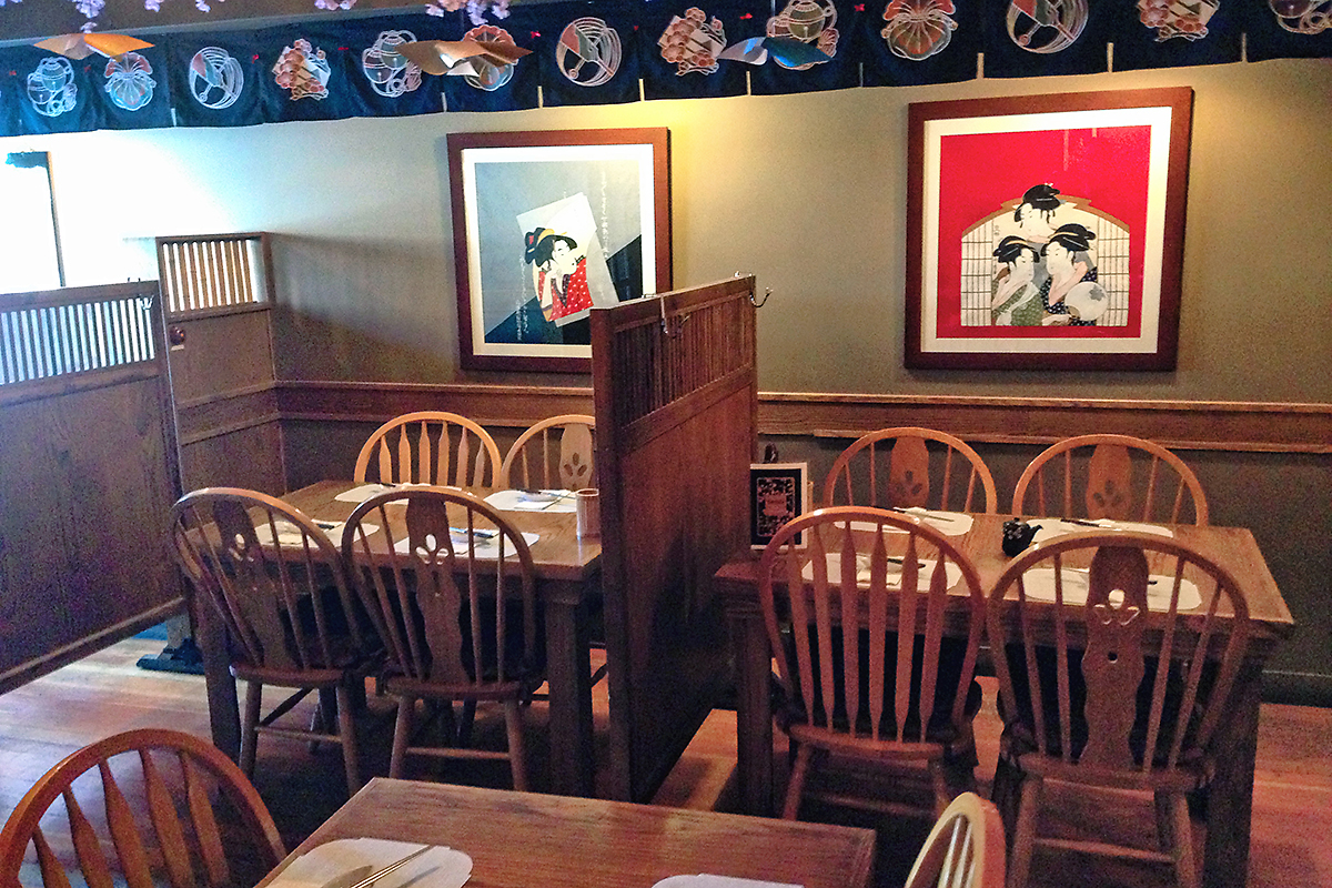 inside restaurant for Sakura Sushi and Grill with tables and chairs 